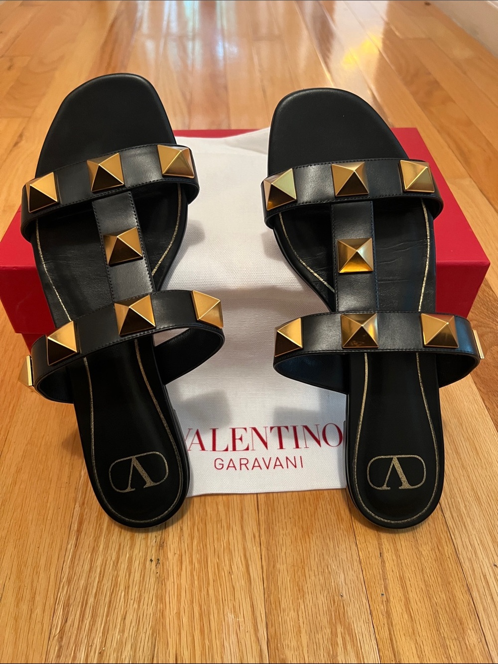 Valentino Garavani calfskin Roman Stud flat slide sandals in black Size 39.5